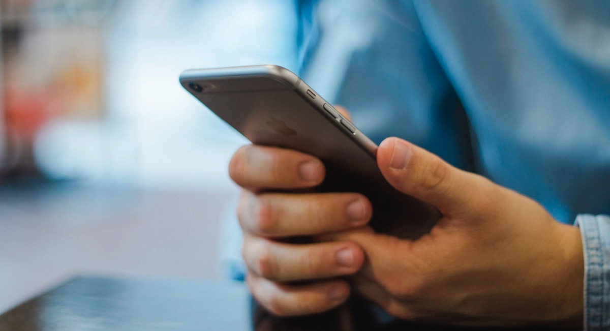 Man holding mobile phone