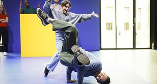 Oksana Chusovitina and Ardan Galymuly at the Paris 2024 Team Visa Summit participate in a branding workshop on Wednesday, Nov. 1, 2023 at the Palais de Tokyo in Paris.(Thomas Padilla/AP Images for Visa)