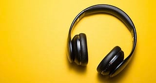 Headphones on yellow background