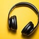 Headphones on yellow background