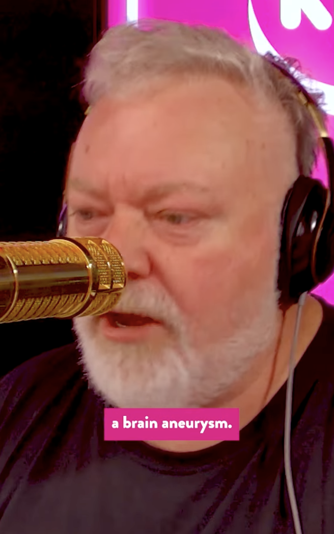 Kyle Sandilands speaking into microphone