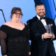 Toni Lodge and Ryan Jon Dunn speak onstage during the 29th Annual Webby Awards.