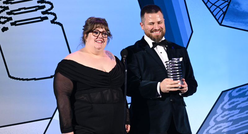 Toni Lodge and Ryan Jon Dunn speak onstage during the 29th Annual Webby Awards.