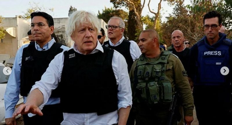 David Woiwood (back right), pictured with former UK Prime Minister Boris Johnson, former Australian Prime Minister Scott Morrison while touring Israel after October 7 attacks