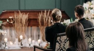 Family grieve at funeral