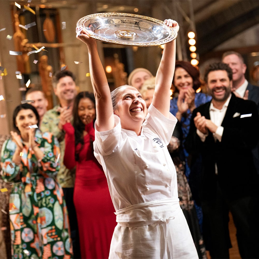 Laura Sharrad lifts the MasterChef Australia trophy
