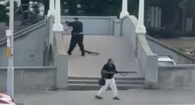 A still from video showing Naveed Akram and his father targeting people during the terror attack.