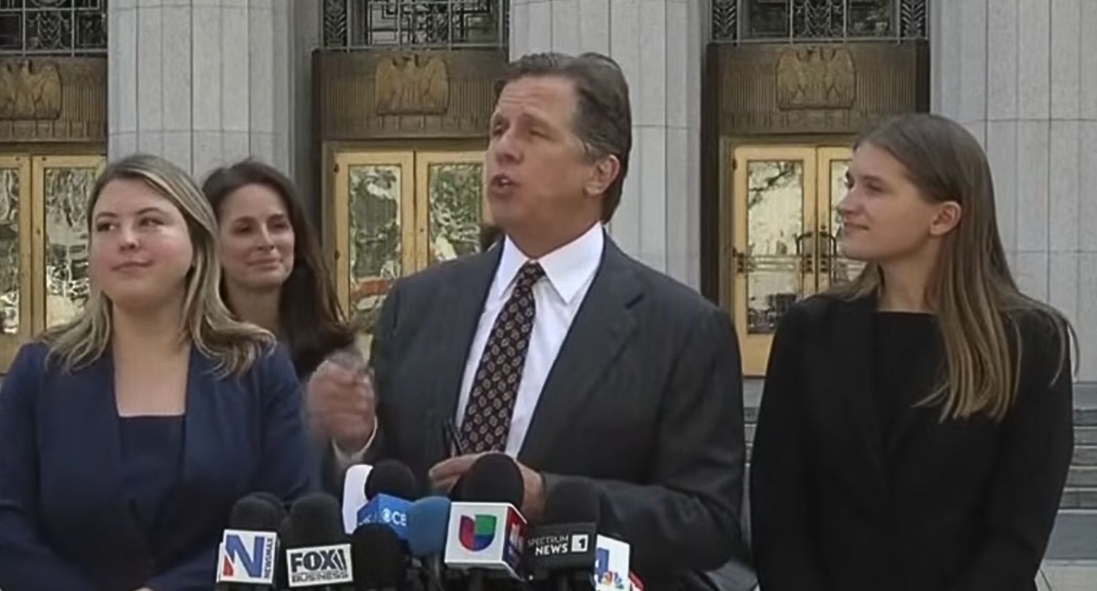 Plaintiff’s lawyer outside the court