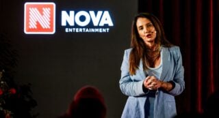 Nova's Nicole Bence on stage at the company's Infronts.