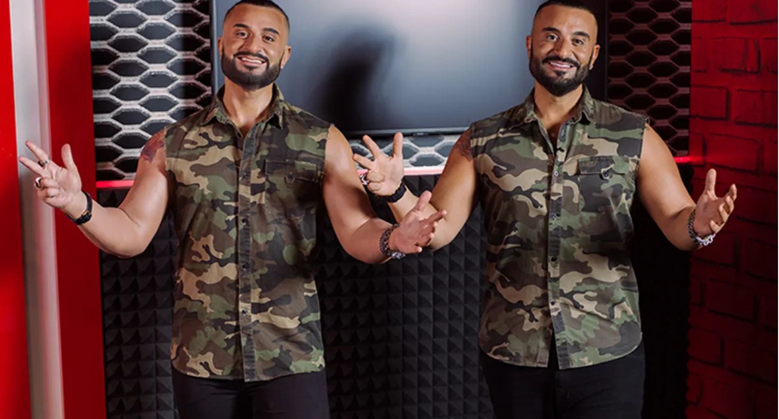 Kris Fade (right) beside his wax figure... I mean, we think he's on the right?