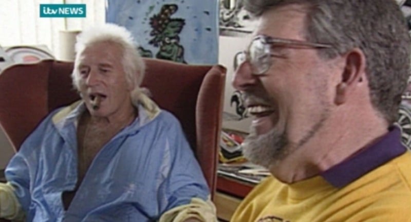 L-R: Jimmy Saville, and Rolf Harris in a documentary for iTV