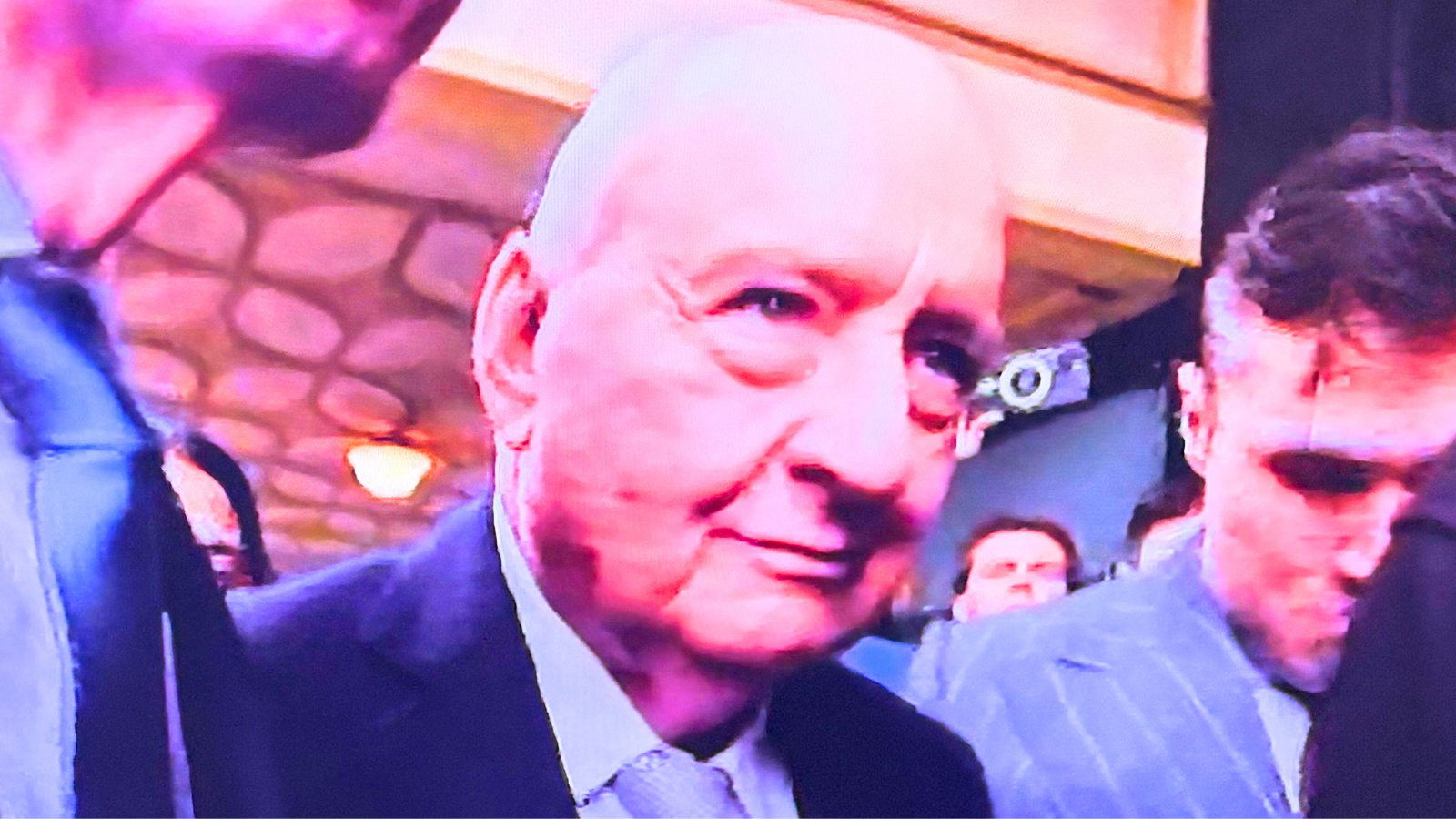 Alan Jones won't answer questions from media throng as trial begins