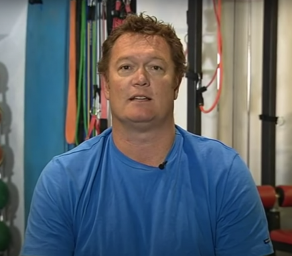 Image of Luc Longley being interviewed in 2014