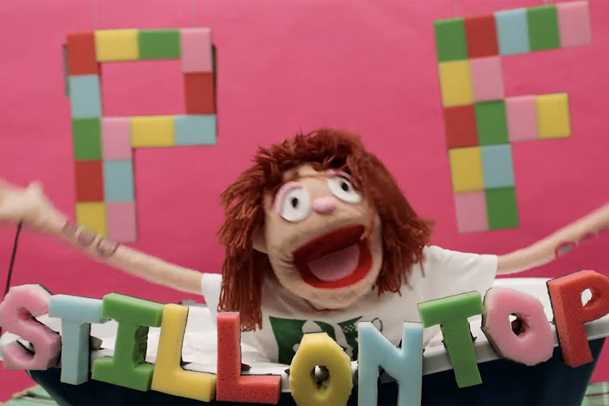 Screenshot of the video to 'Give War a Chance' by Private Function