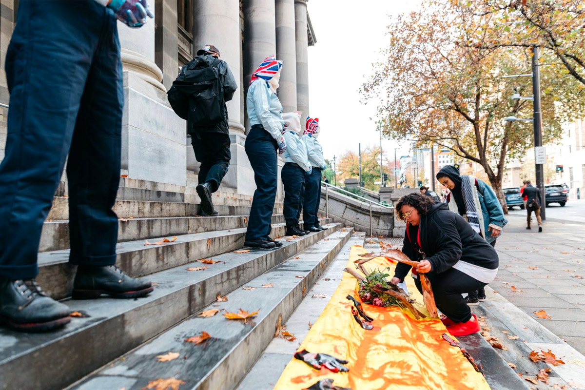 Wayne’s sibling Latoya Aroha Rule and Fatima Mawas lay a petition of 25,000 signatures on the steps of SA Parliament calling for a legislated ban on spit hoods