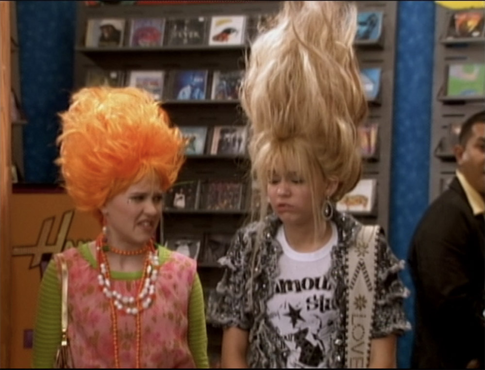 Emily Osment and Hannah Montana in an episode of 'Hannah Montana' with the Ammonia 'Mint 400' on the rear shelf.