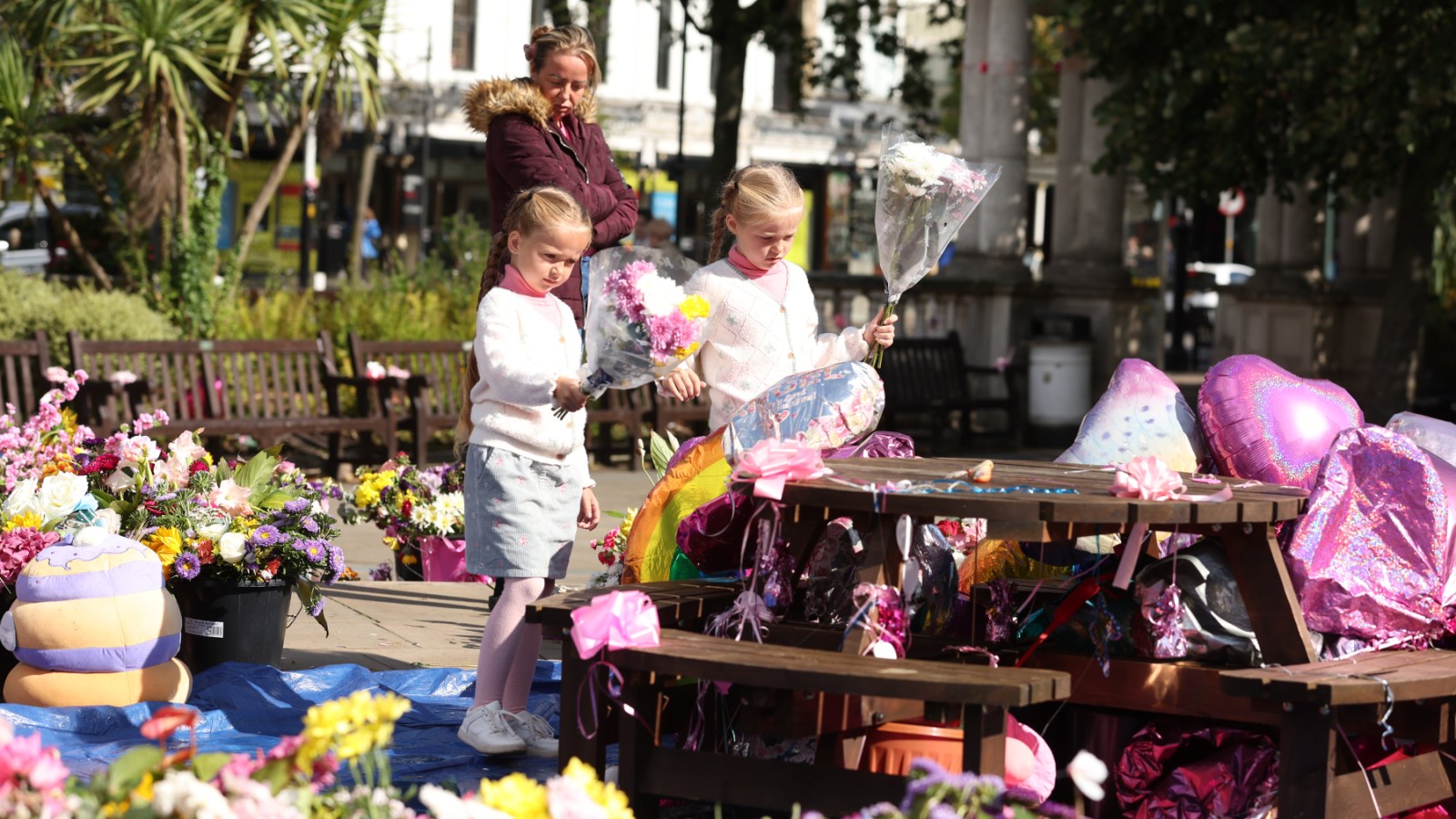 Mourners leave flowers at a tribute for the victims of the Southport stabbing attack