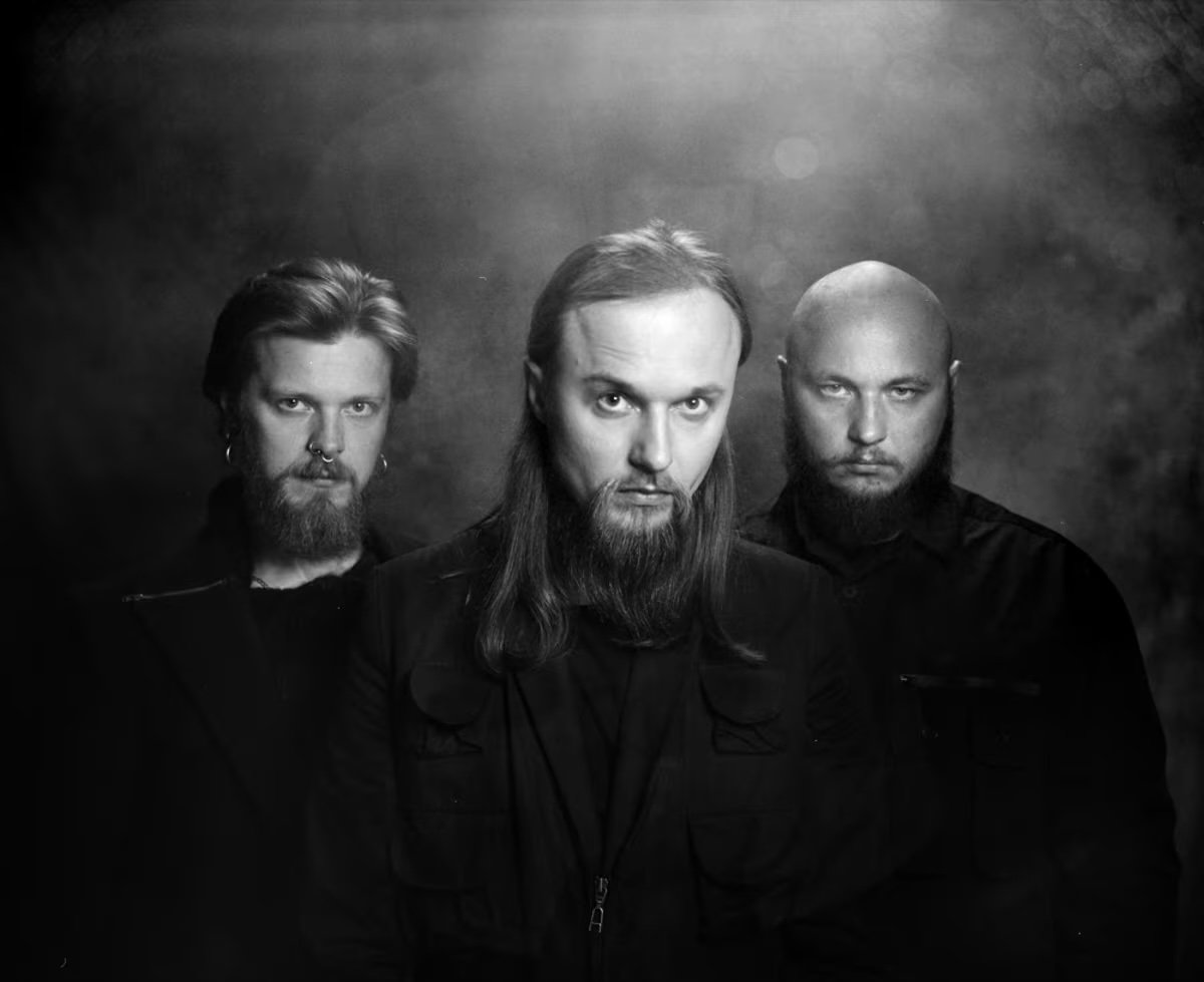 A black and white photo of Molchat Doma's Egor Shkutko; Roman Komogortsev; Pavel Kozlov