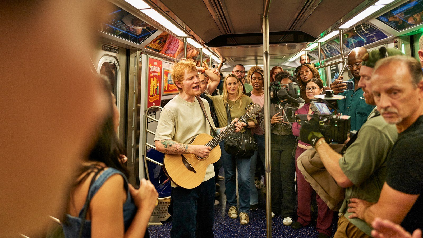 Ed Sheeran sings on subway