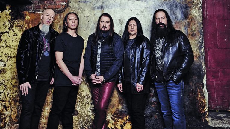 Five members of US rock group Dream Theater standing in a line