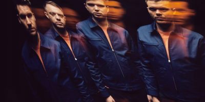 UK quartet Everything Everything, their faces distorted and echoed.