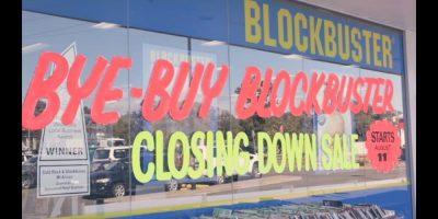 Closing down advertisements in chalk on the front window of Mt Annan Blockbuster Video