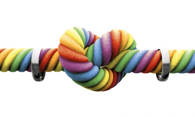 A rainbow coloured rope ties the knot.