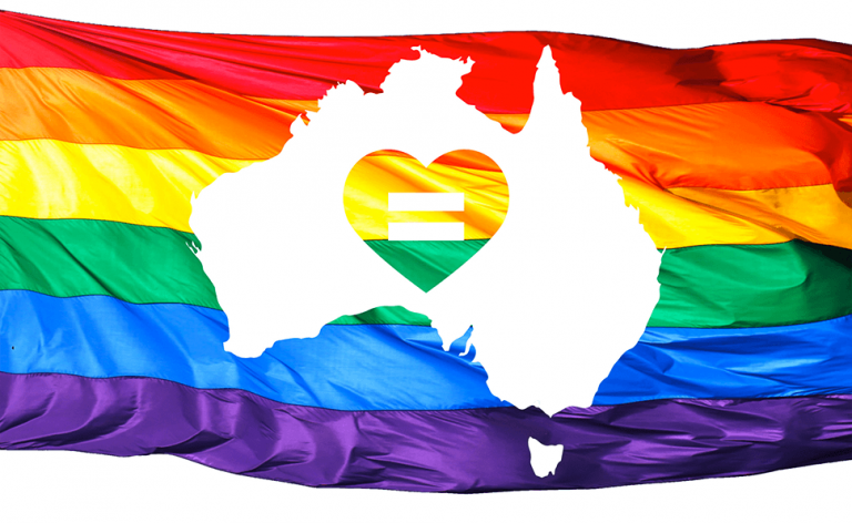 LGBT flag behind an outline of Australia