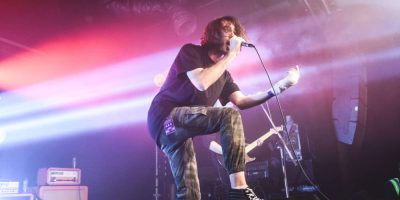 With Confidence frontman Jayden Seeley gestures with his fractured wrist to the Factory Crowd