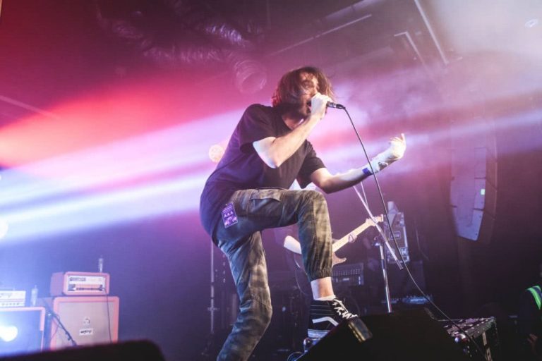 With Confidence frontman Jayden Seeley gestures with his fractured wrist to the Factory Crowd