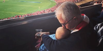 Facebook image of Malcolm Turnbull and his granddaughter Alice watching the football