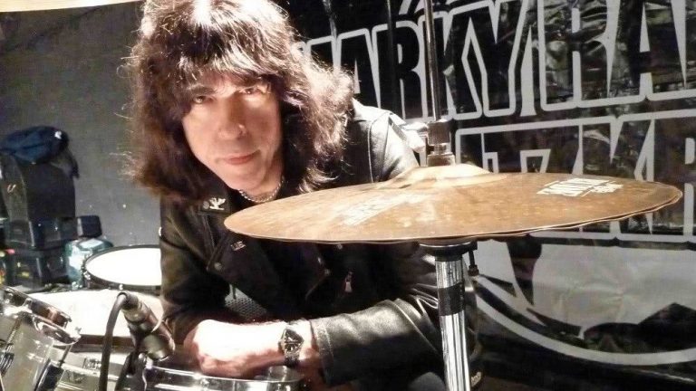 Marky Ramone sitting at his drum set