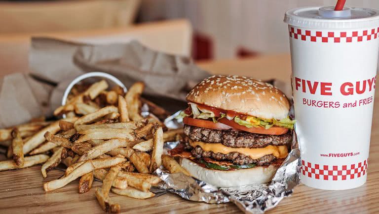 Photo of fries, a burger and a milkshake from Five Guys