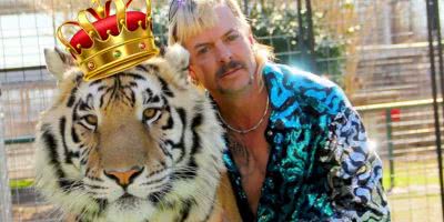 Tiger King Joe Exotic with a tiger.