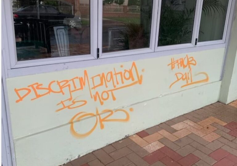 A Melbourne cafe has been targeted with anti-vax graffiti already