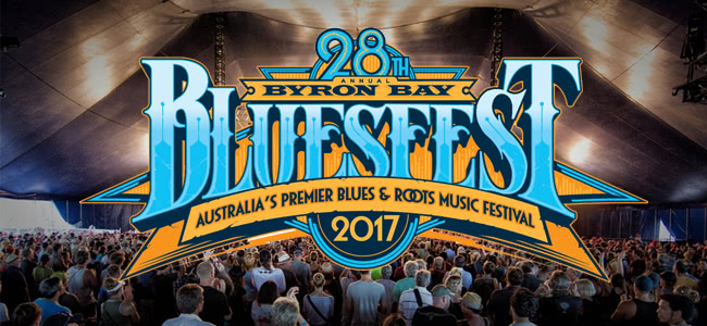 Crowed under stand with Bluesfest font over photo