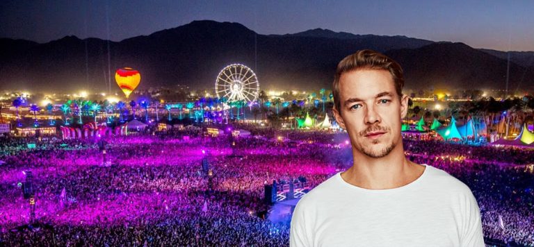 Diplo in white shirt with crowed, ferris wheel and mountains in background.