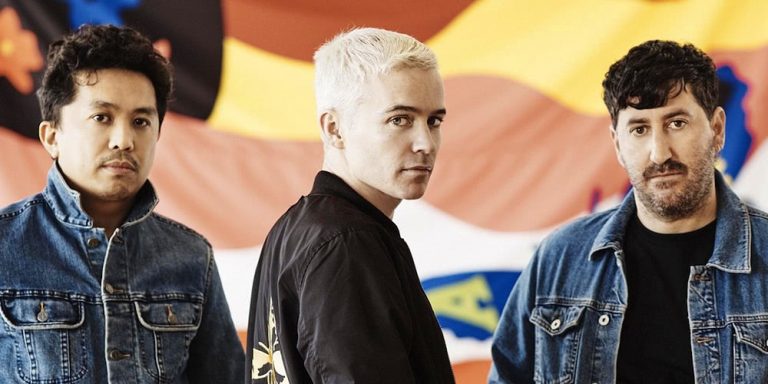 Members of The Avalanches, wearing 'Wildflower' jackets