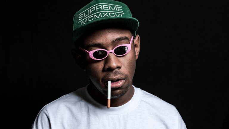 Tyler, The Creator with a cigarette in his mouth