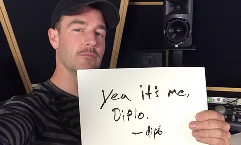 James Van Der Beek holds a sign saying "Yep it's me Diplo"