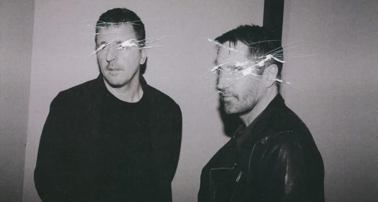 Atticus Ross and Trent Reznor of Nine Inch Nails, with digital scratching effects over their faces