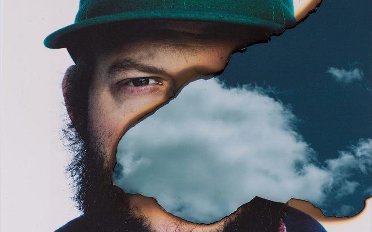 Justin Vernon of Bon Iver, with his face obscured
