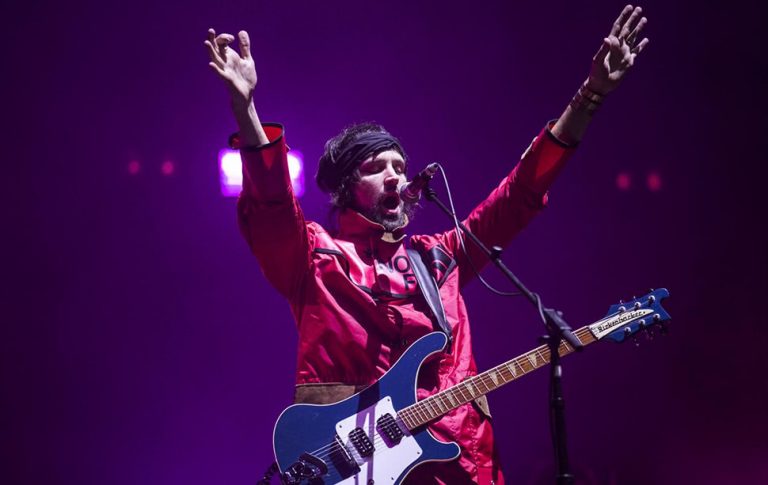 Kasabian's Sergio Pizzorno playing at Reading Festival 2017
