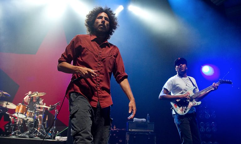 Members of alternative-metal band Rage Against The Machine performing live