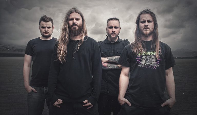 All four members of Polish death metal band Decapitated