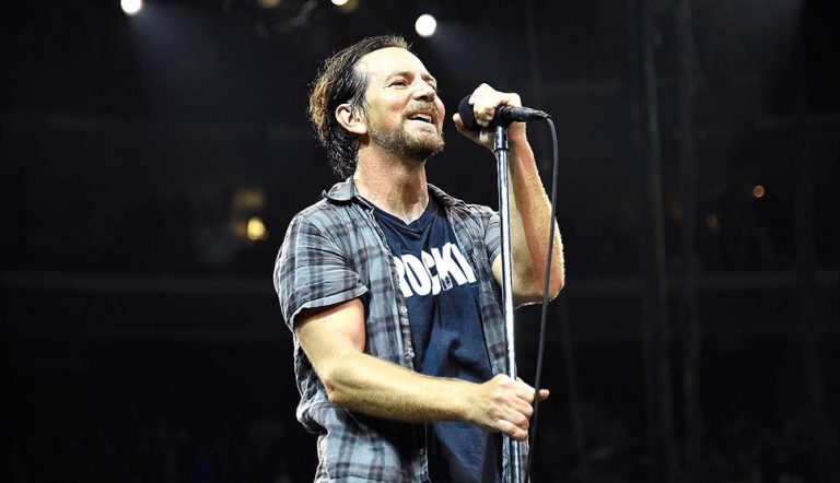 Pearl Jam frontman Eddie Vedder performing live