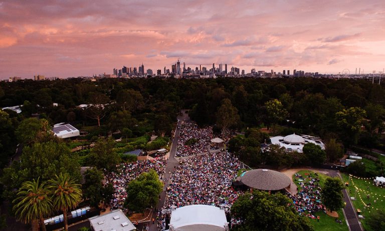 An aerial ahot of Melbourne Zoo Twilights and the city skyline