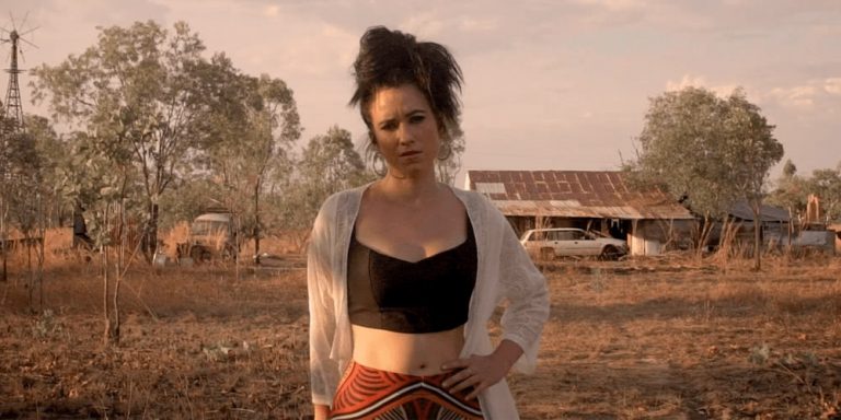 Screenshot from Caiti Baker's 'Rough Old Town' music video.