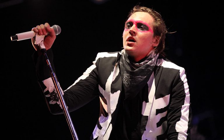 Arcade Fire's Win Butler performing live