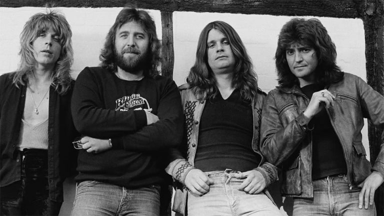 Ozzy Osbourne with former bandmates, including Bob Daisley, right.